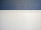 Blue-wall-with-white-paneling-